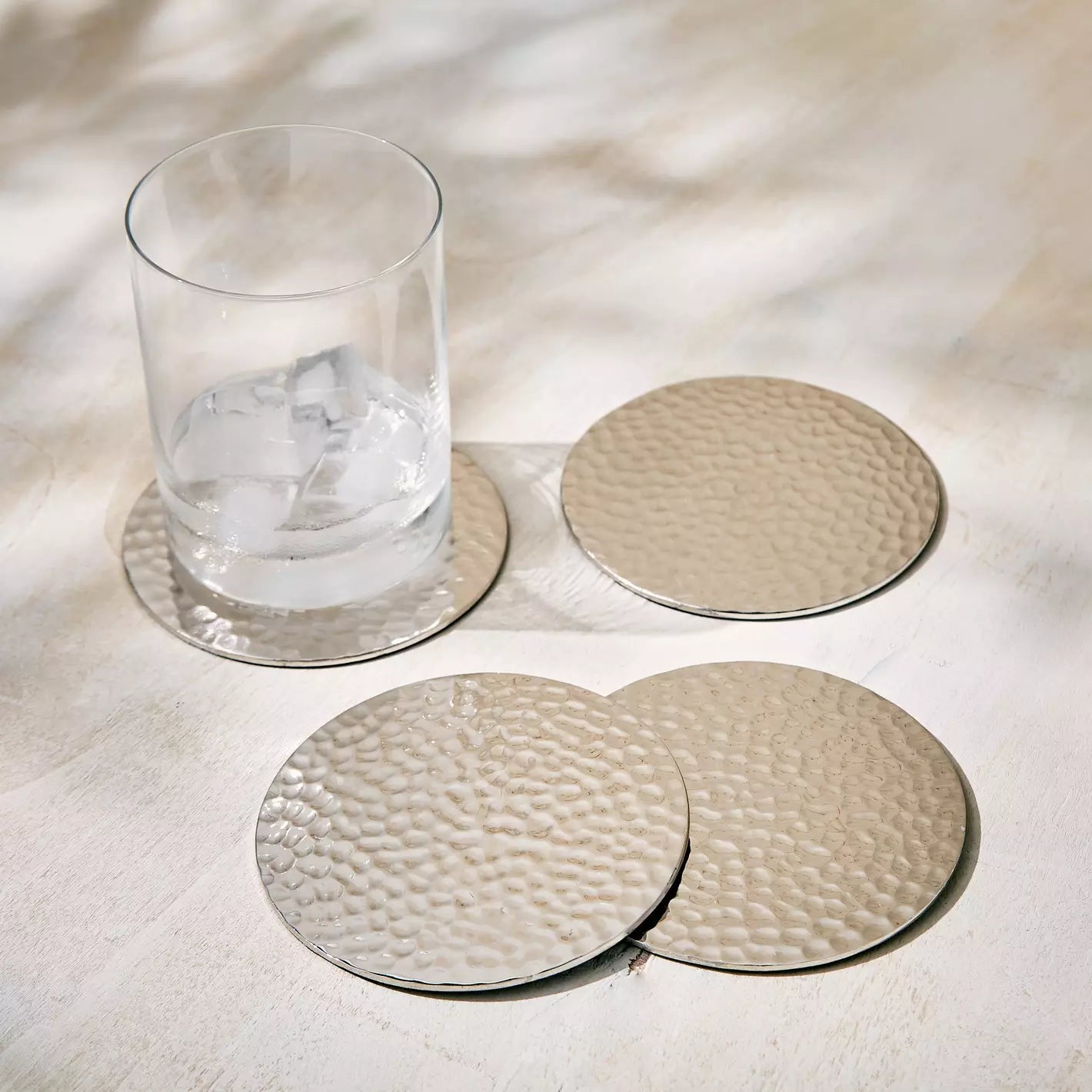 The Hammered Coasters Set of 4 in Silver