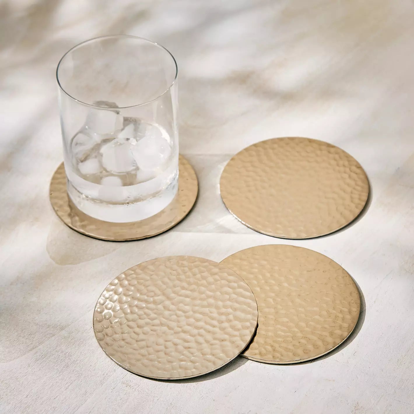 The Hammered Coasters Set of 4 in Gold