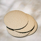The Hammered Coasters Set of 4 in Gold