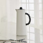 قارورة مفرغة من الهواء من ذا بيدز، سعة 1 لتر، مصنوعة من البلاستيك والزجاج، باللونين الأبيض والأسود