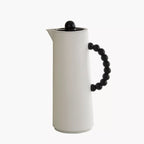 قارورة مفرغة من الهواء من ذا بيدز، سعة 1 لتر، مصنوعة من البلاستيك والزجاج، باللونين الأبيض والأسود