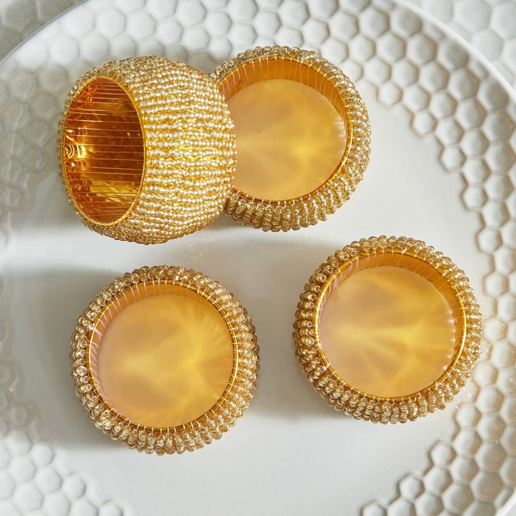 مجموعة من 4 حلقات منديل ذهبية مرصعة بالخرز