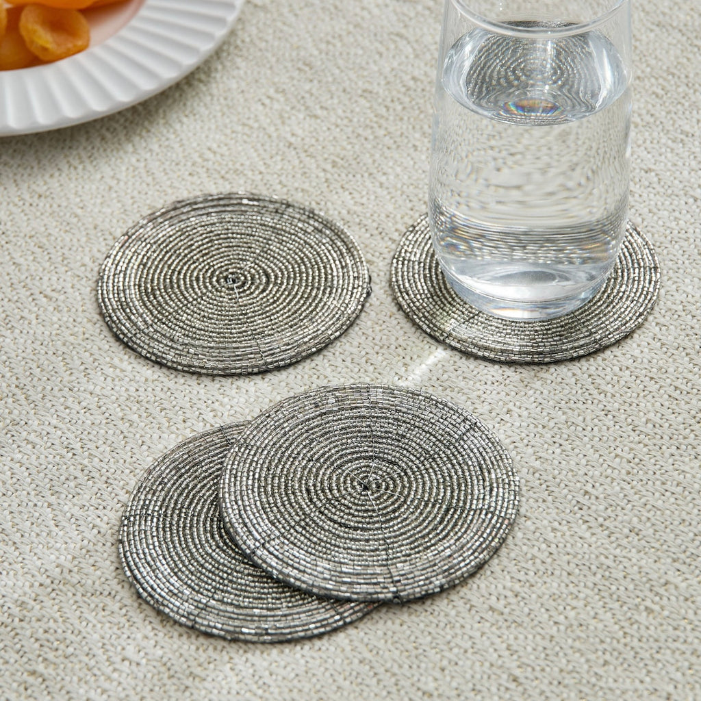 مجموعة من 4 قواعد أكواب فضية مرصعة بالخرز