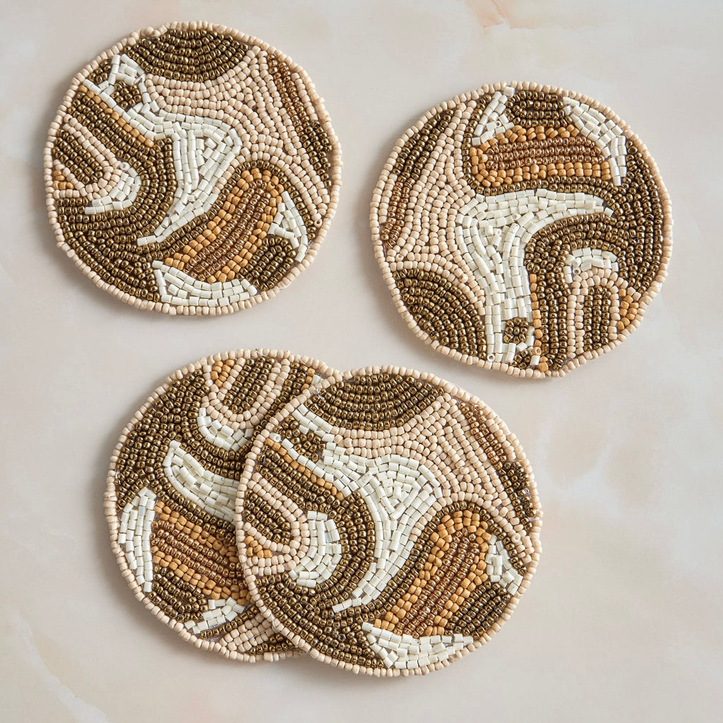 مجموعة من 4 قطع من قواعد الأكواب المزينة بالخرز