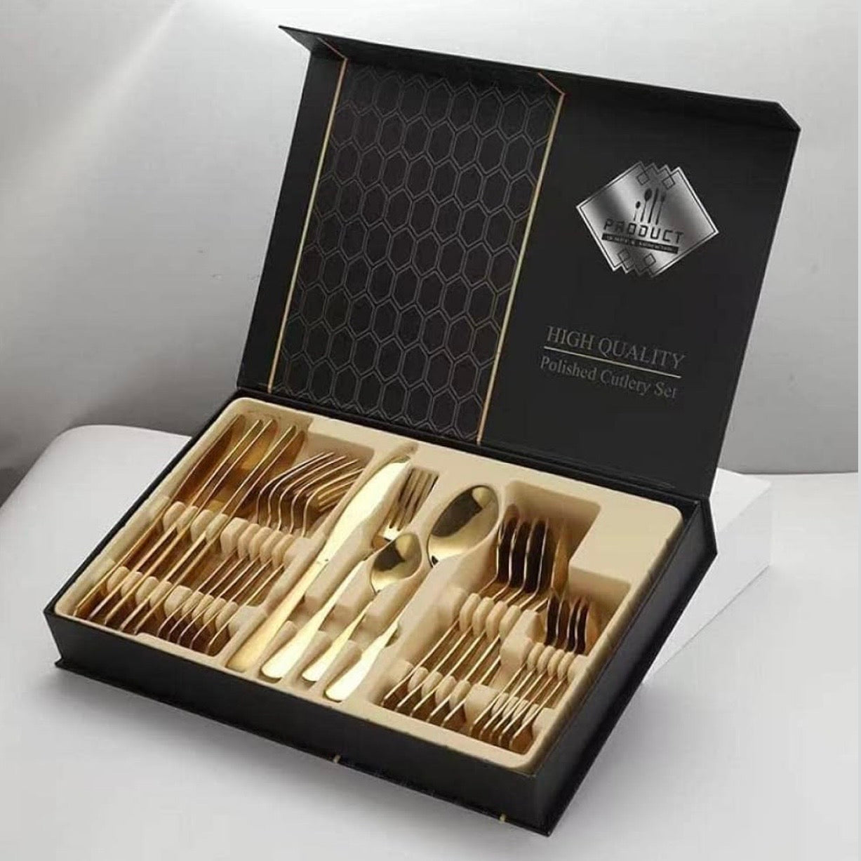 مجموعة أدوات المائدة المنحنية المكونة من 24 قطعة باللون الذهبي