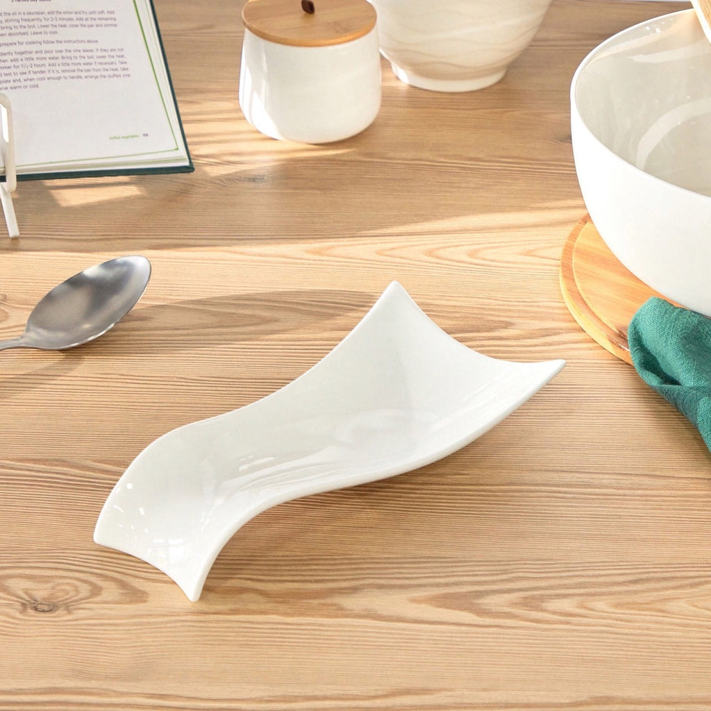 مسند الملعقة من البورسلين باللون الأبيض